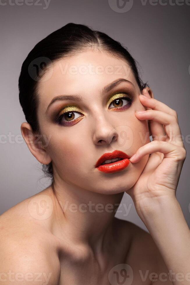 Portrait of beautiful young woman with fresh clean skin photo