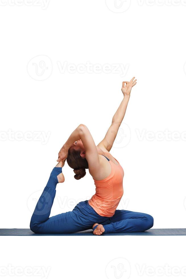 Woman doing Hatha yoga asana Eka pada rajakapotasana photo
