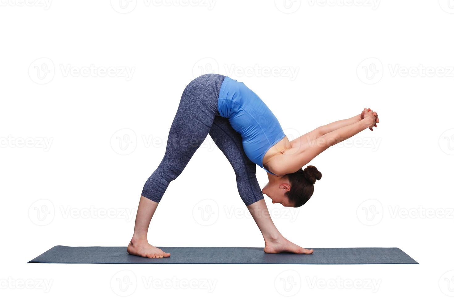 Woman doing Ashtanga Vinyasa yoga asana Parsvottanasana photo