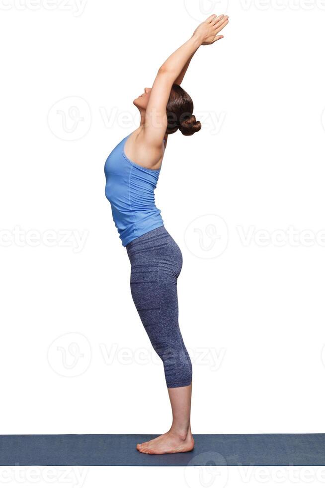 Woman doing Hatha Yoga asana Tadasana photo