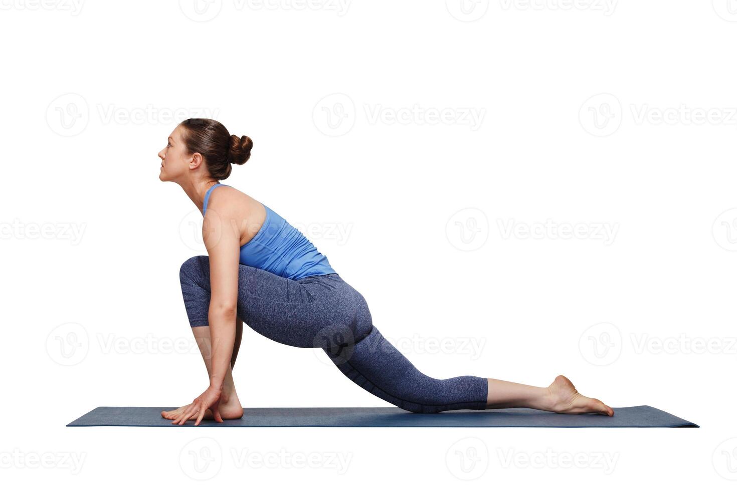 Woman doing Hatha yoga asana Anjaneyasana photo