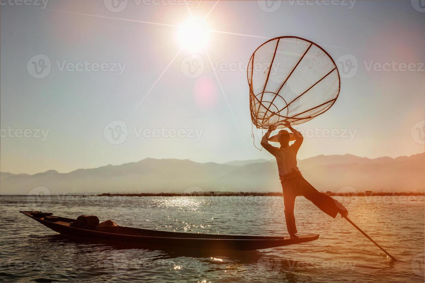 Traditional Burmese fisherman at Inle lake, Myanmar photo