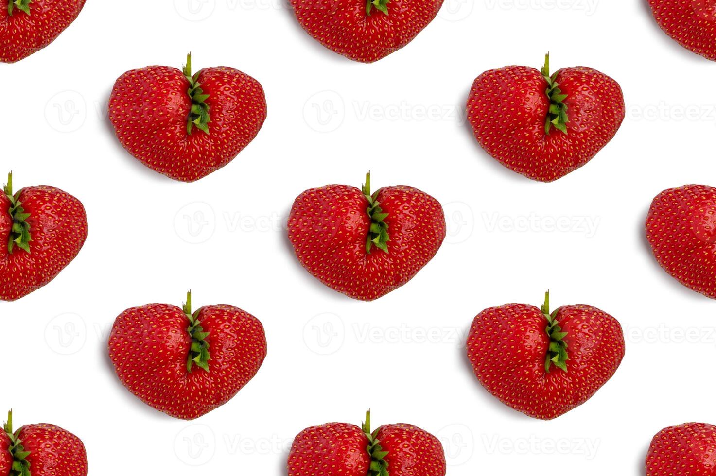 Ugly strawberry in the shape of a heart on s white background. Seamless pattern. Funny, ugly vegetables. photo