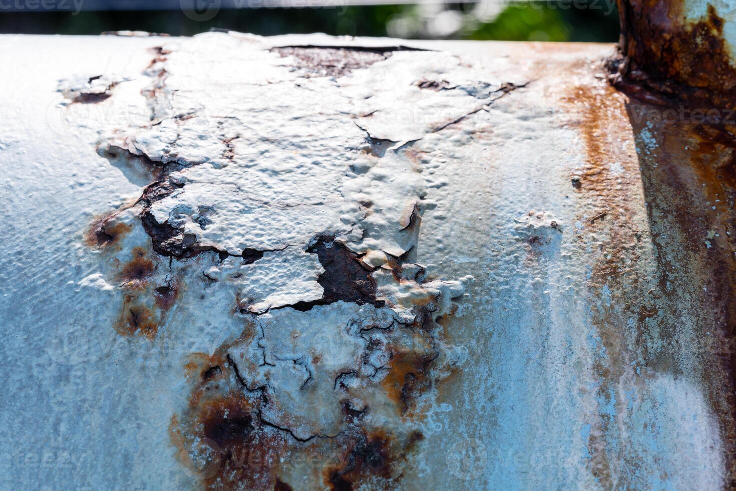 Rusty Metal Grunge Texture on the wall of an old water pipe. Corrosion of objects. photo