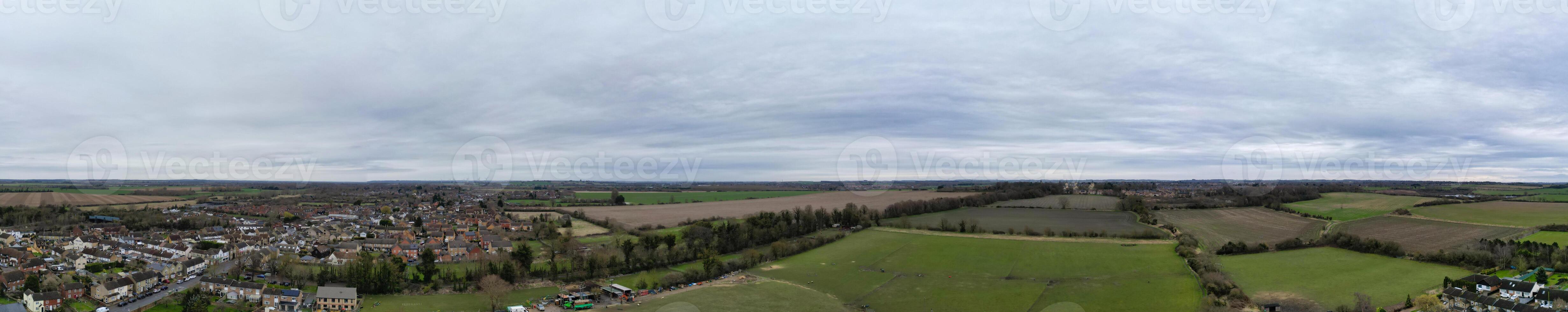 High Angle Panoramic View of Arseley Town of England UK. The Footage Was Captured During Cloudy and Rainy Day of Feb 28th, 2024 photo