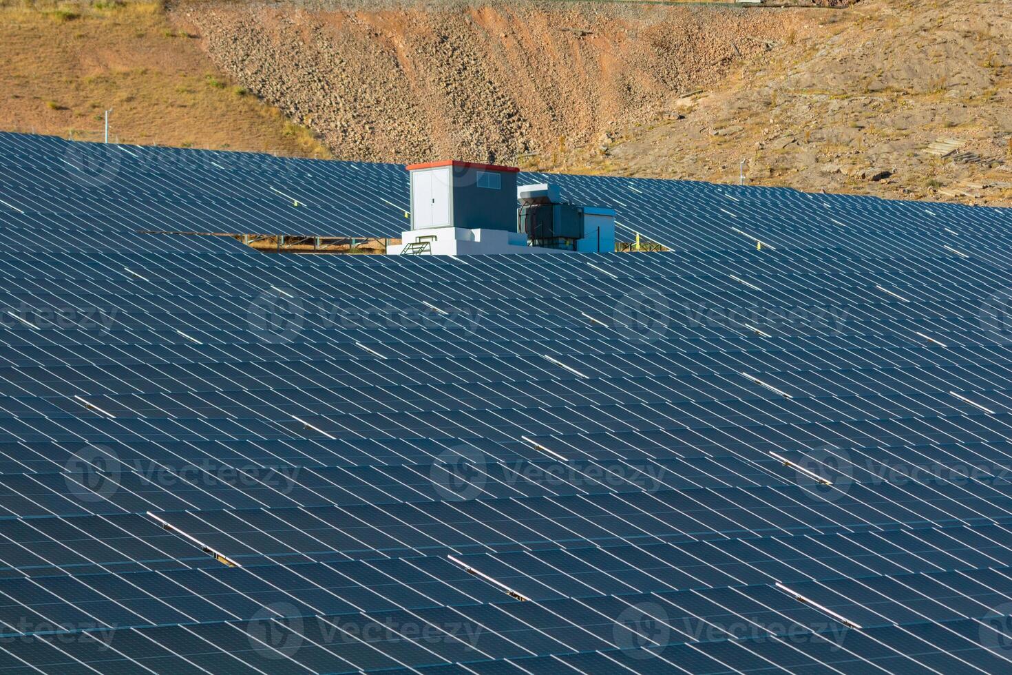 PV or photovoltaic panels of solar power plant on the hill. photo