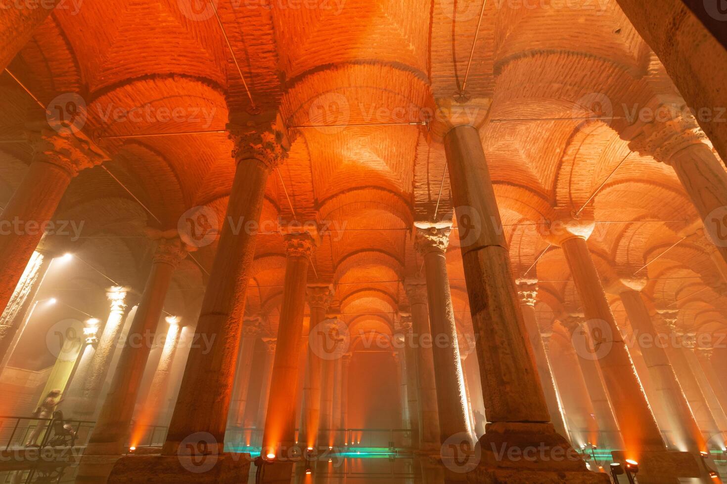 Vaults and columns of Basilica Cistern with orange light ambient photo