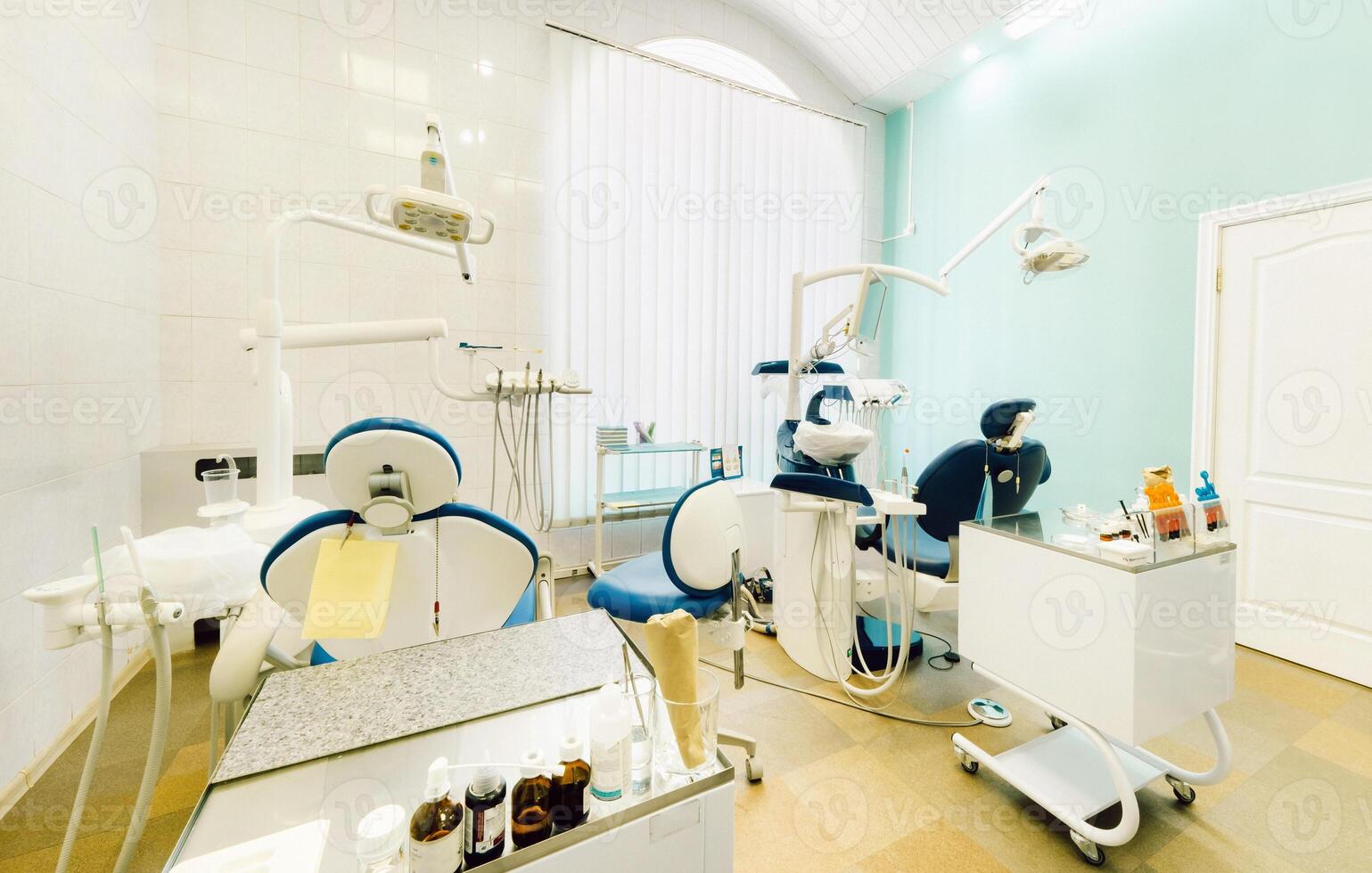 An empty chair in the dentist's office. Empty dentist's office photo