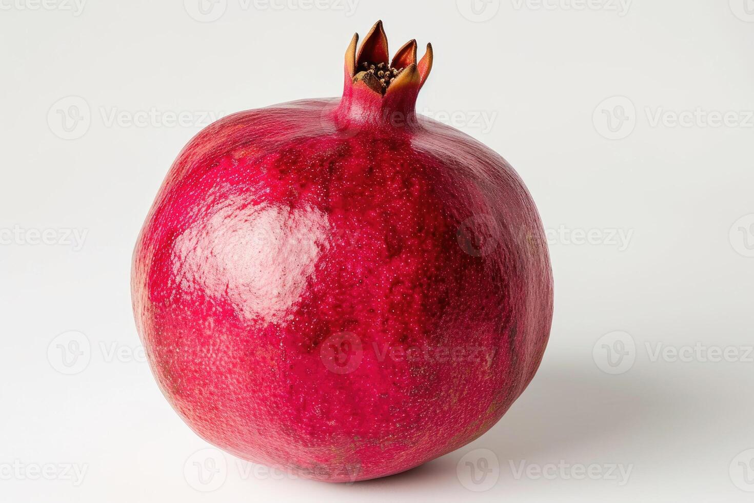 AI generated Close-Up View of a Ripe Pomegranate on a White Background This image shows a detailed and vibrant red pomegranate with a smooth, shiny skin isolated against a clean white backdrop. photo