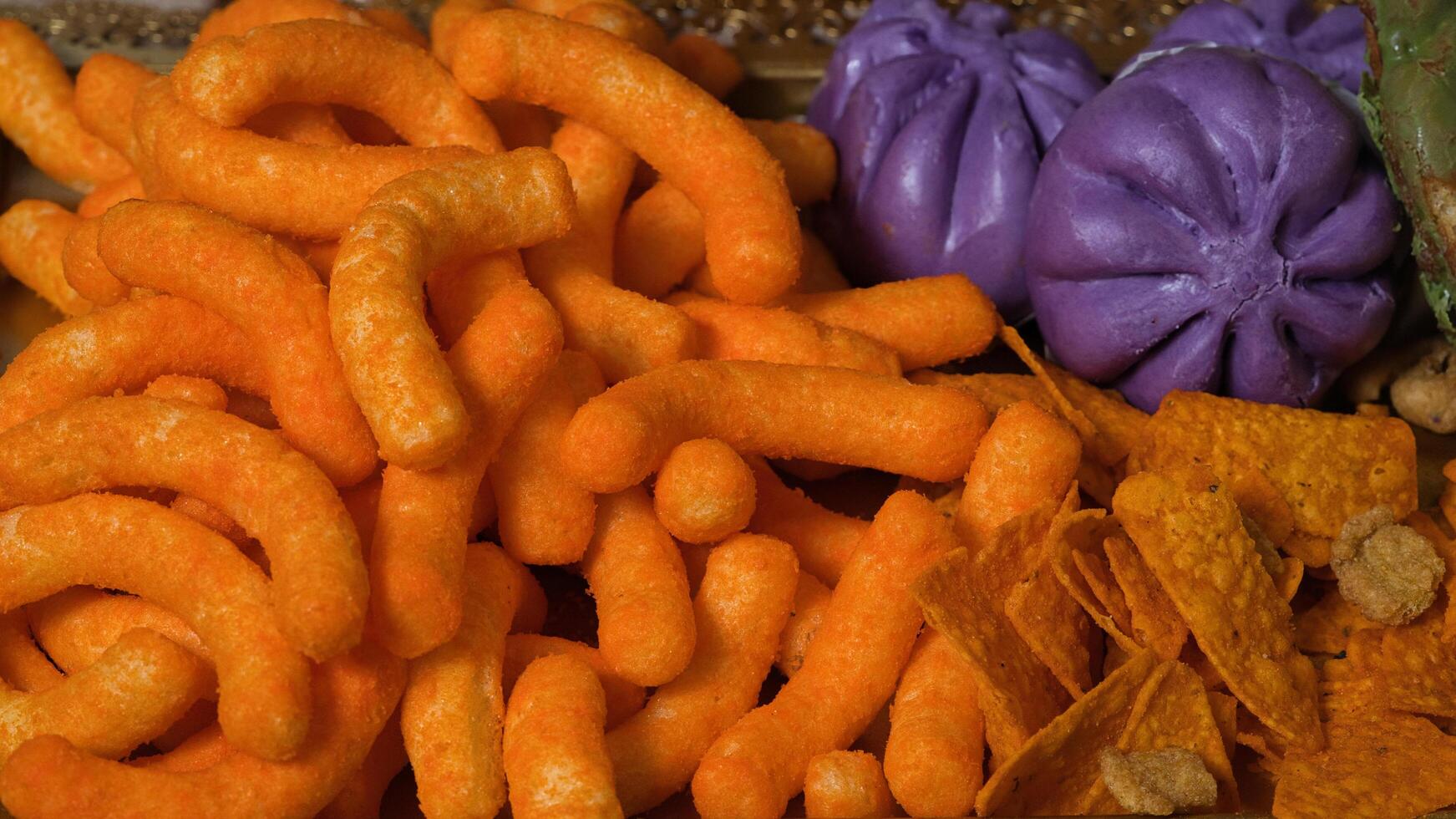 a tray of different types of snacks photo