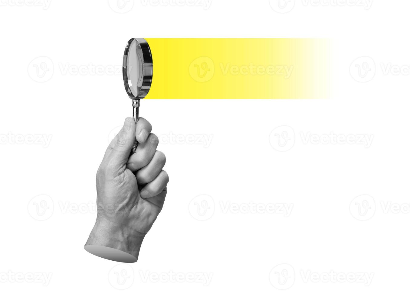 Magnifying glass in hand, searching, focusing on yellow light. Insight, solution and study concept photo