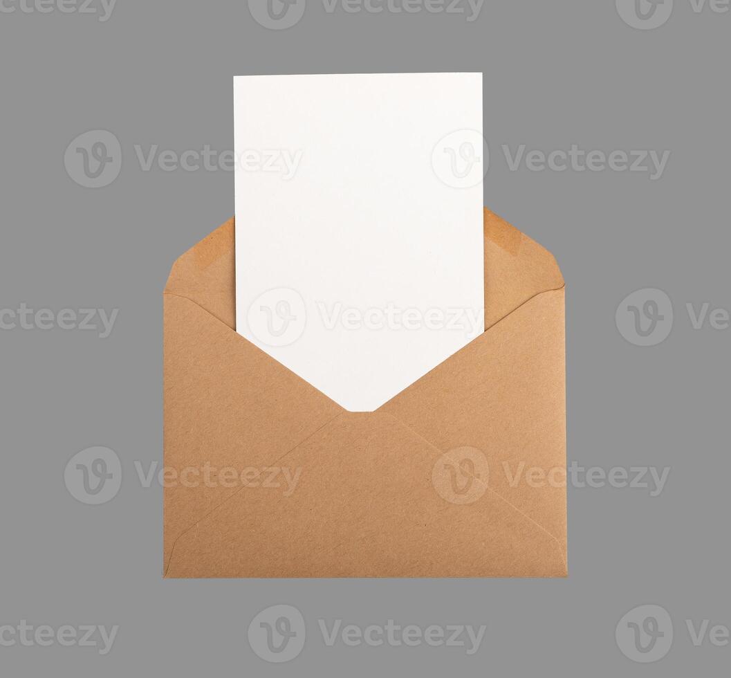 Postcard, vertical card mock up, clean paper sheet from open kraft envelope isolated on white photo