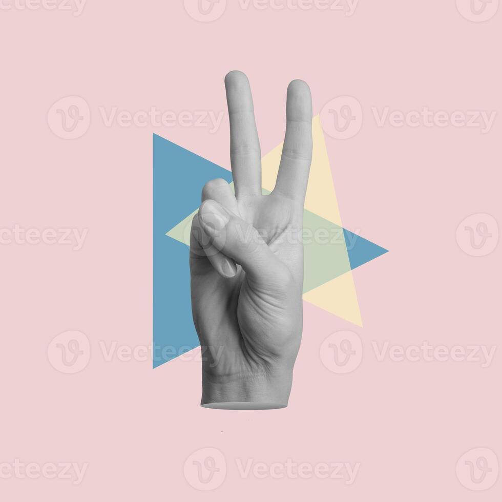 Victory sign, V gesture, hand showing winning, success photo