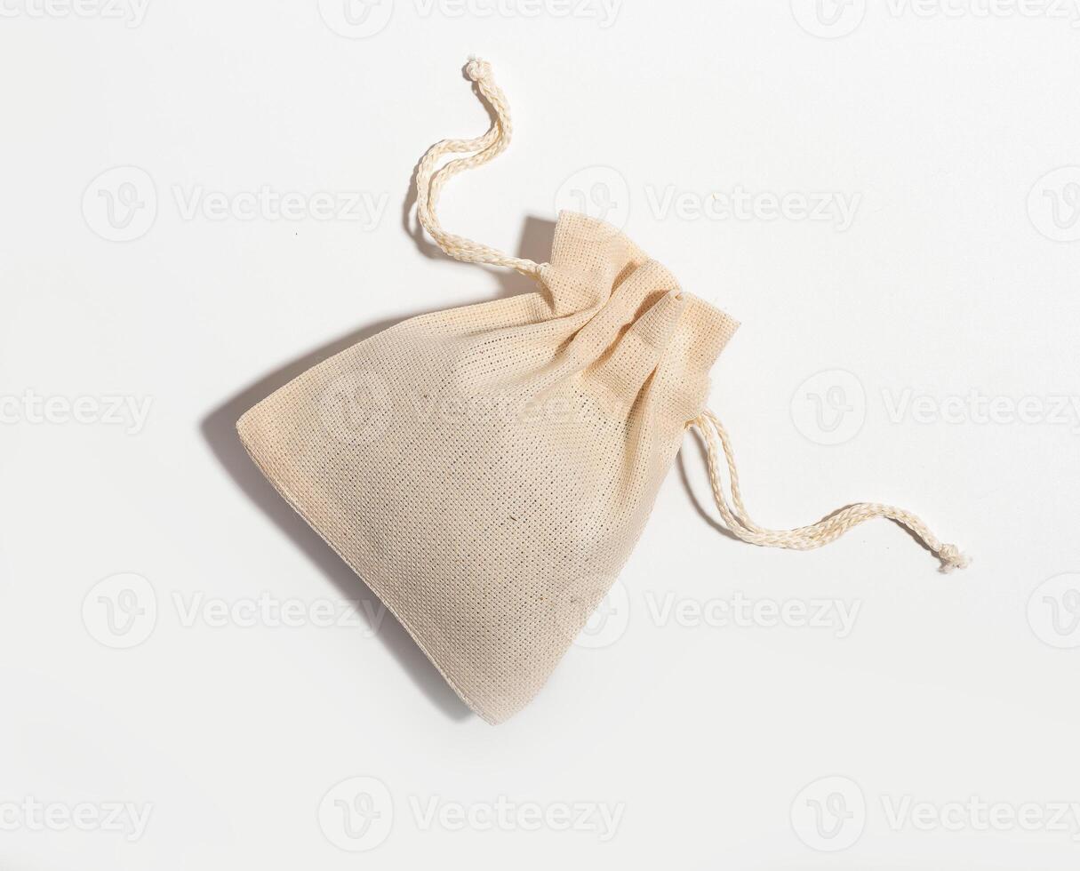 Eco textile small bag mock up. Natural fabric linen cotton sack photo