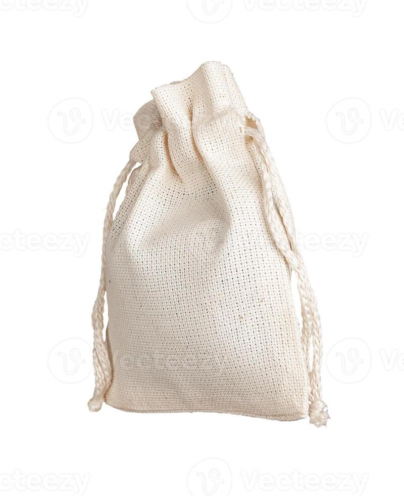 Eco textile bag mockup. Natural eco fabric linen cotton sack with strings isolated on white photo