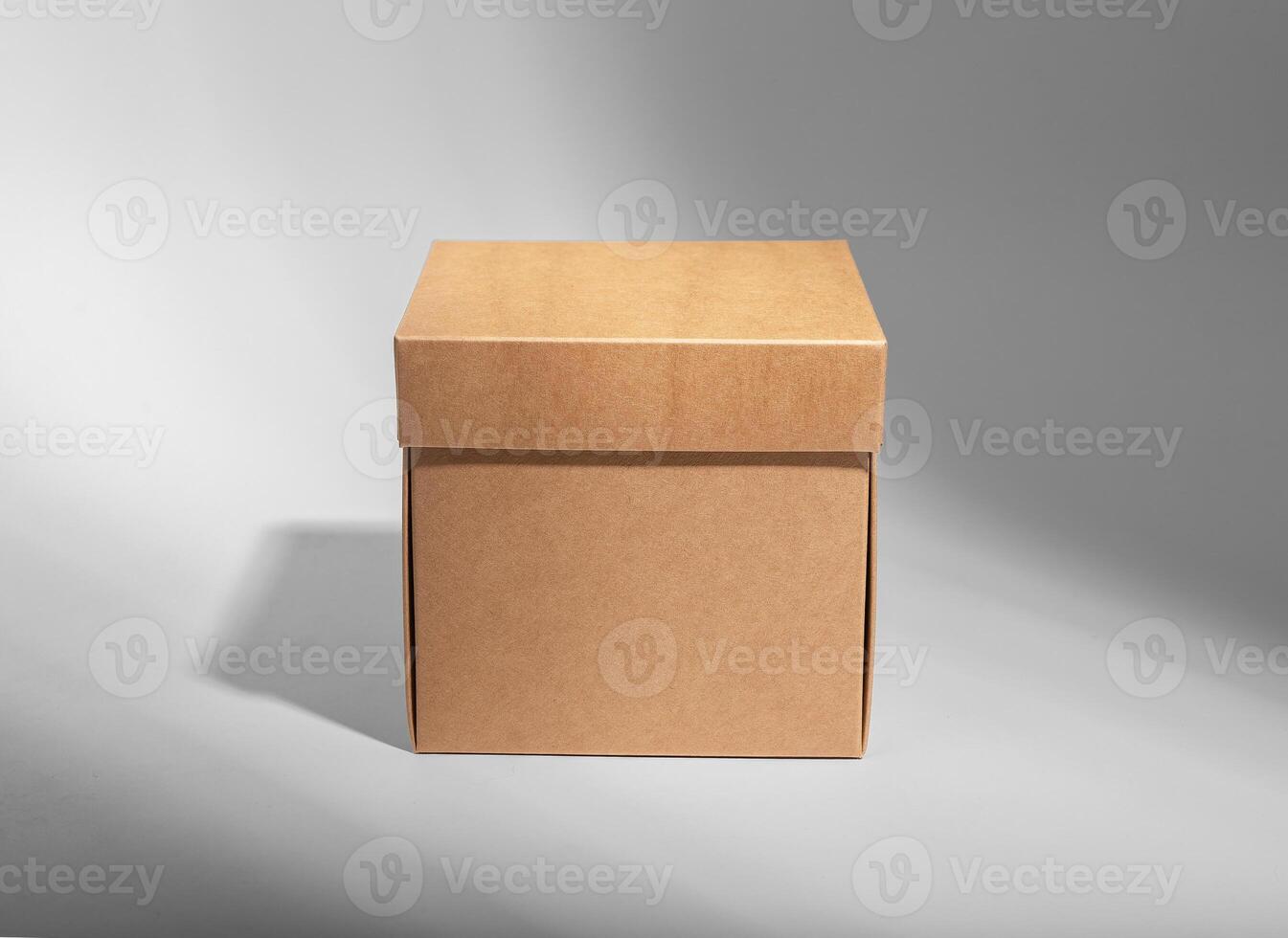 Kraft carton box of cube shape, cardboard package photo