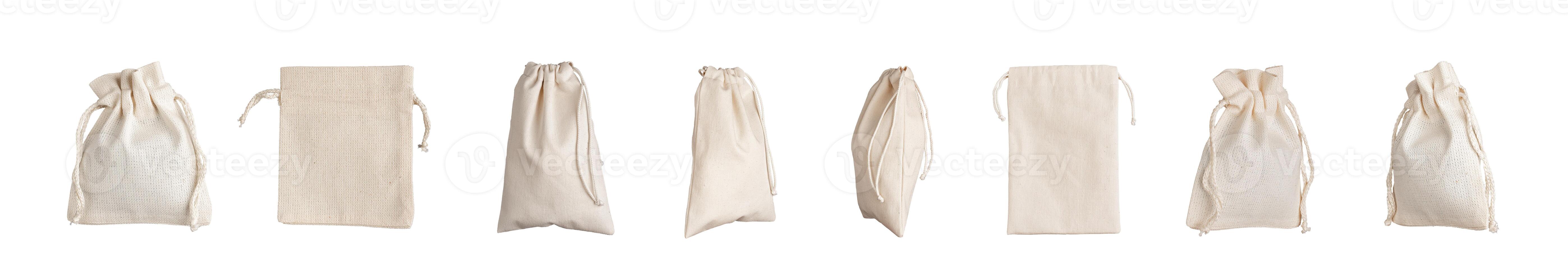 Textile bags set, pack mock up. Natural organic cotton sack isolated on white photo