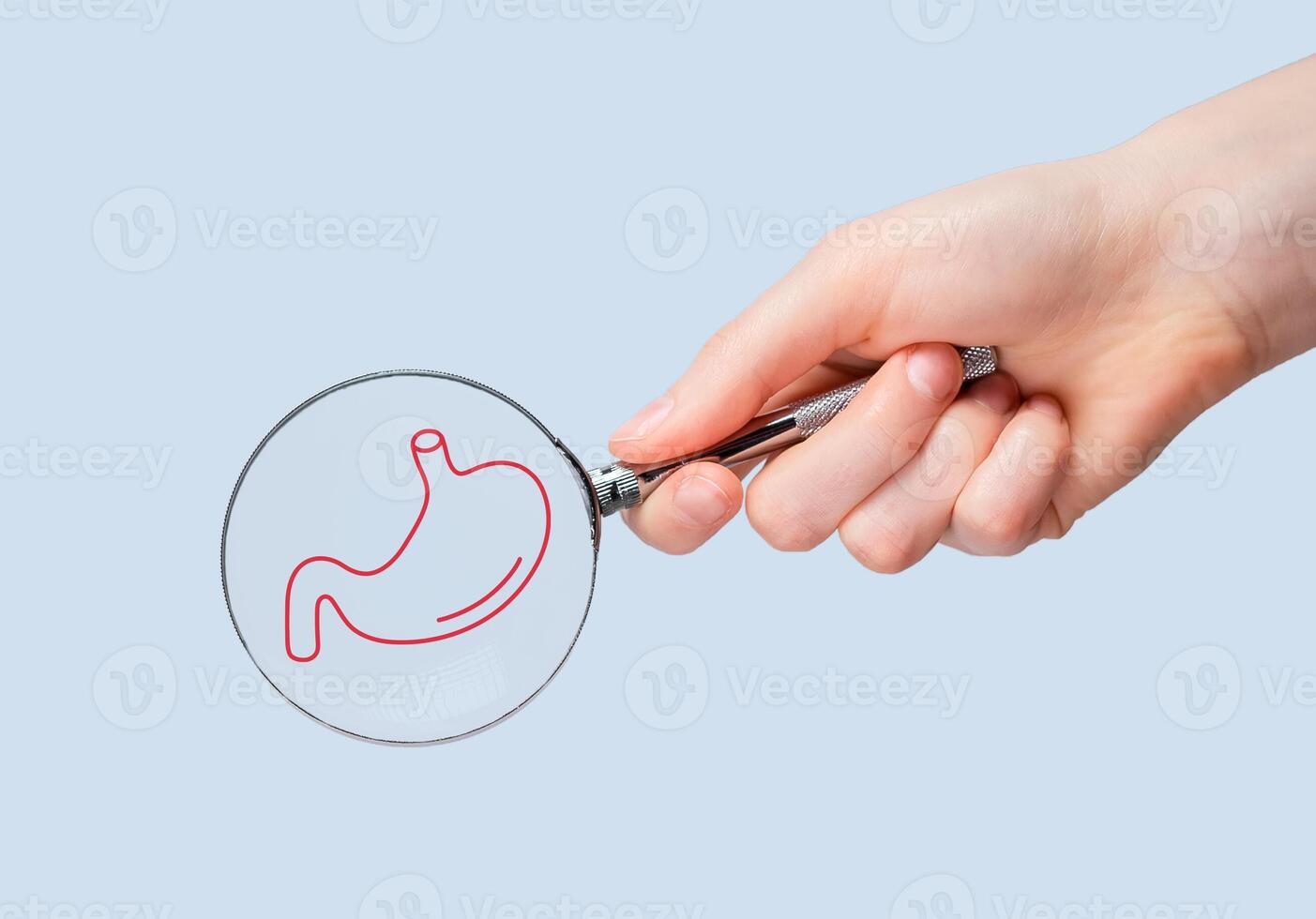 Stomach health checkup, study through magnifying glass photo