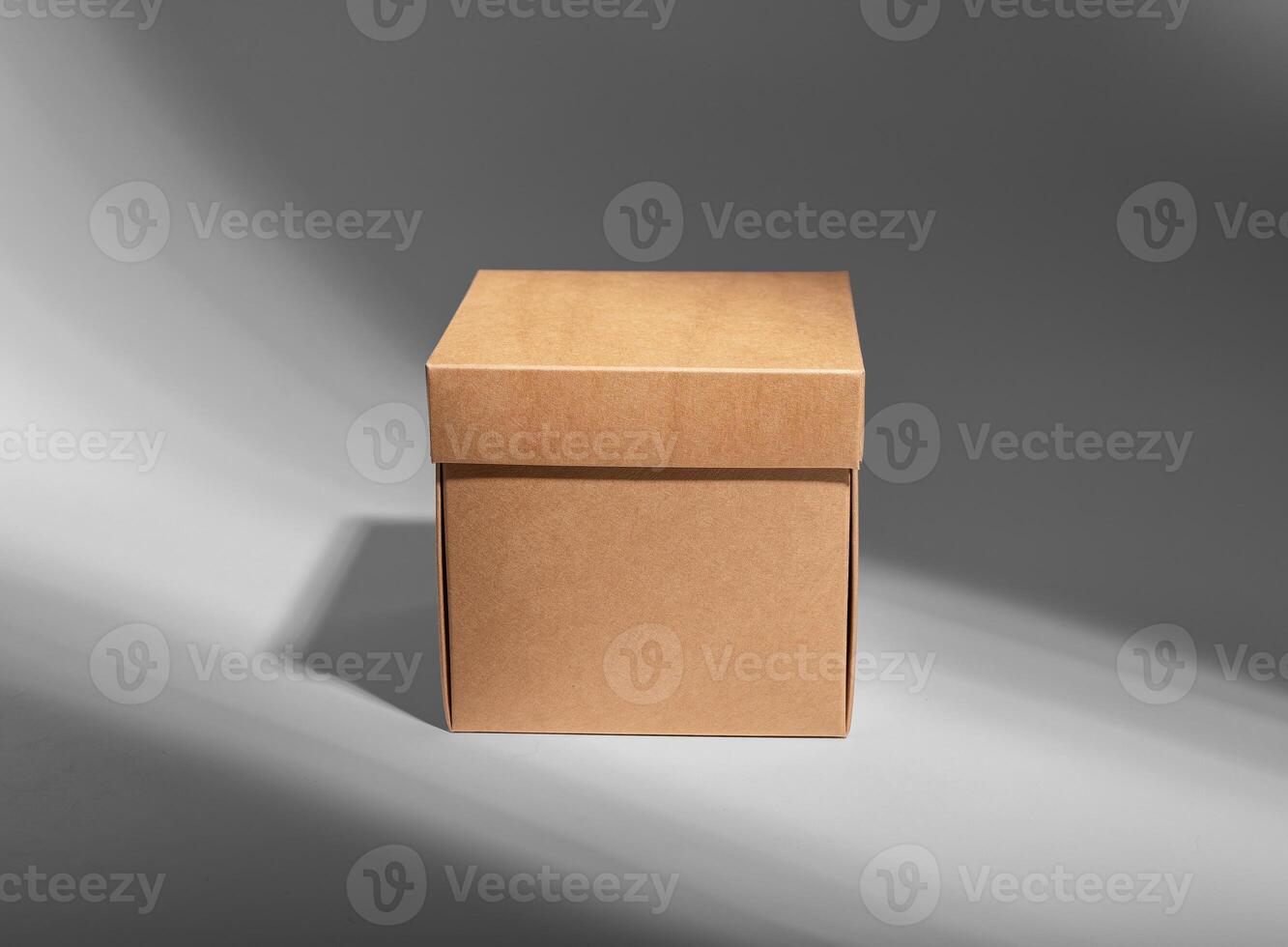 Kraft carton box of square shape, cardboard package photo