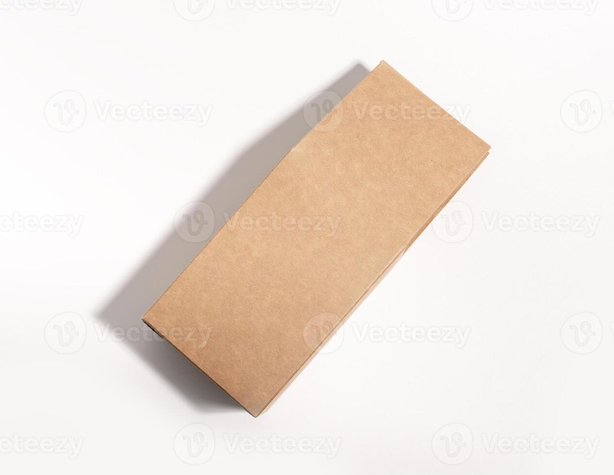 Blank craft product package, brown box mockup. Vertical carton pack mock up photo