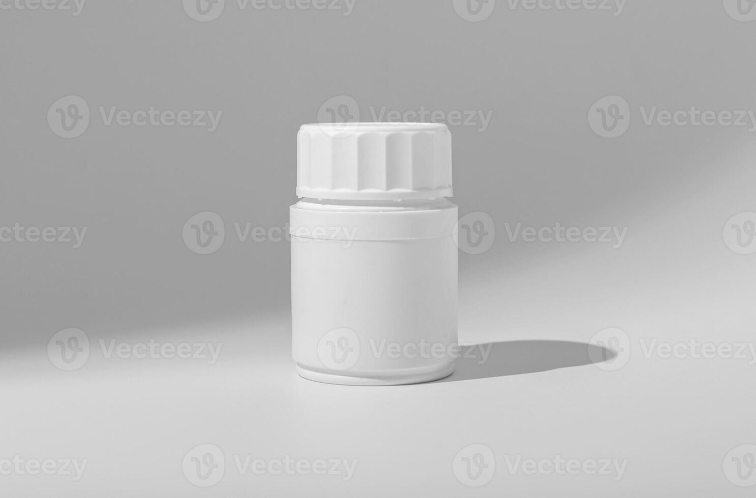 White medical jar for pills, capsules, vitamins and medicines photo