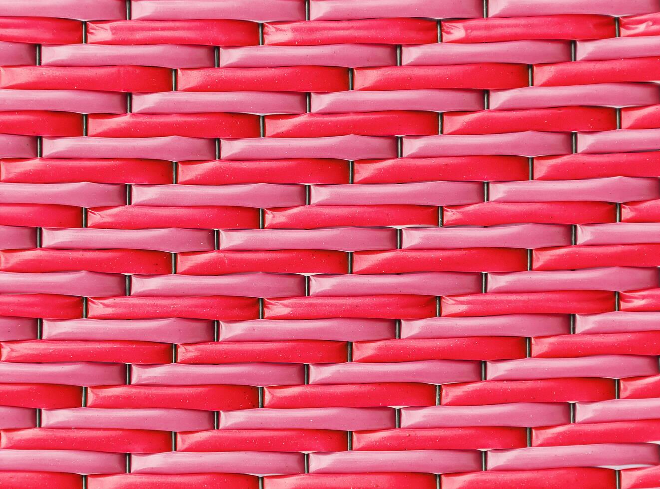 Close up pattern texture red woven mat background photo