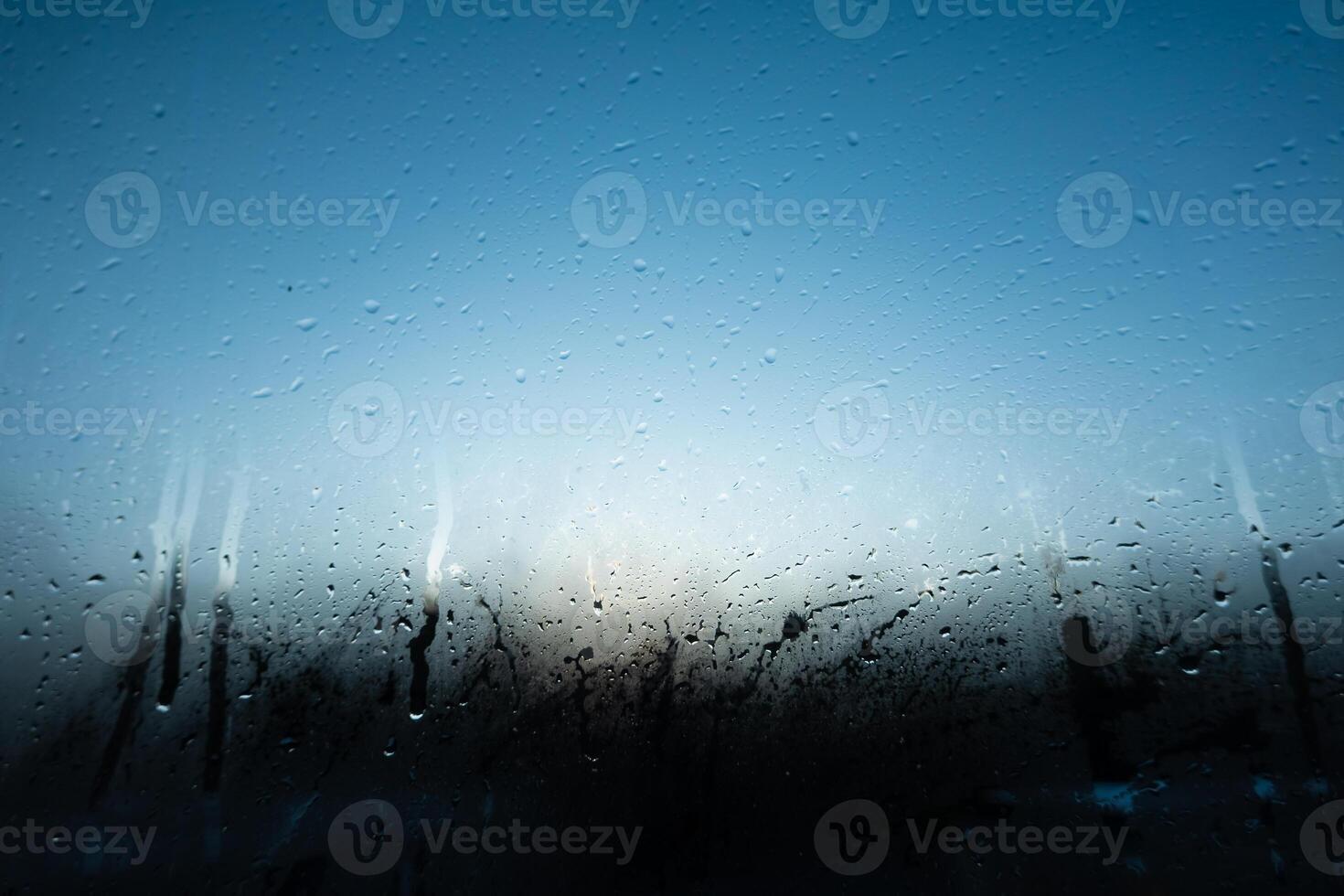 Window Rain, raindrops creating a beautiful, textured surface on a clear window texture background photo