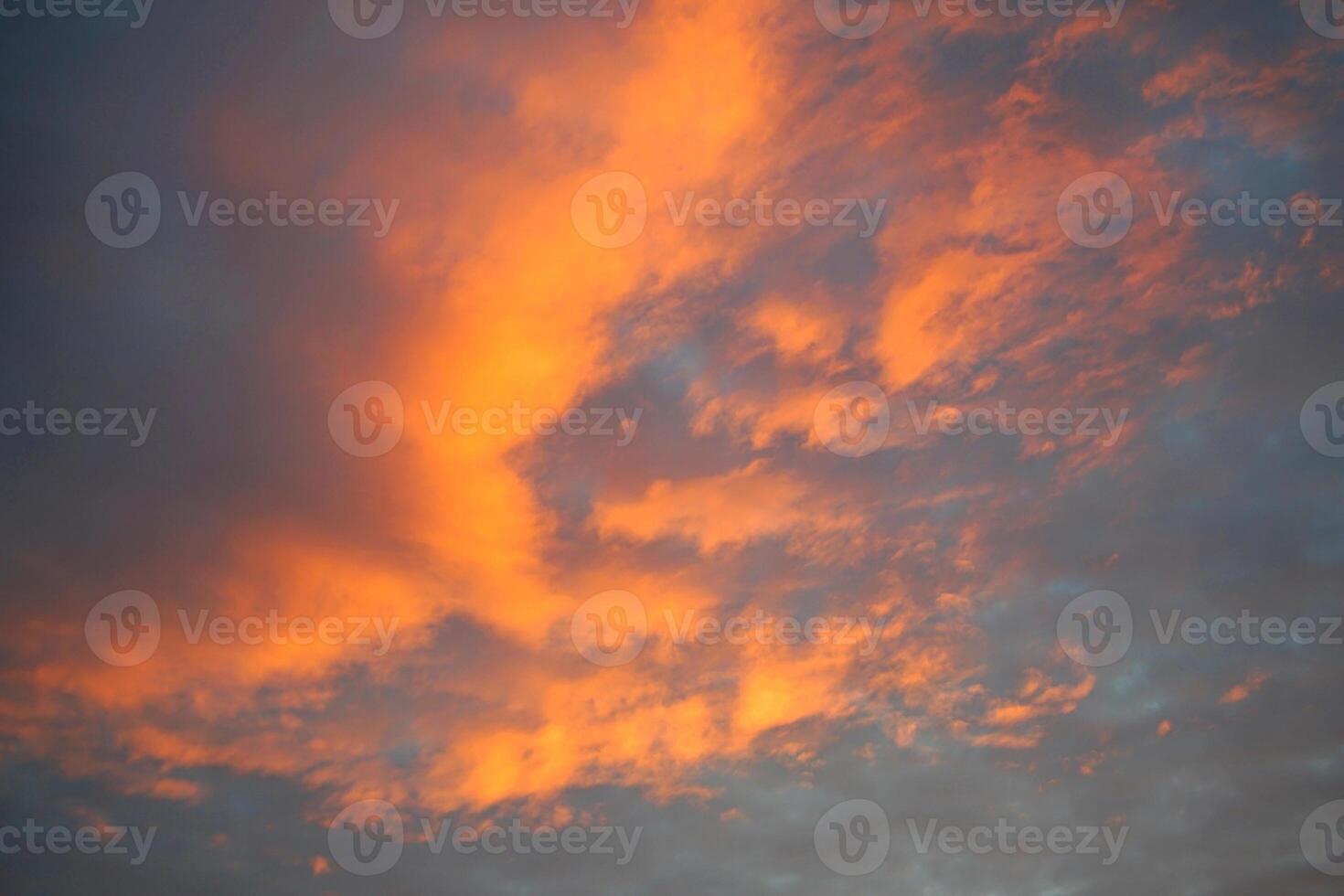 Amber Embrace, Enchanting Evening Sky with Fiery Clouds photo