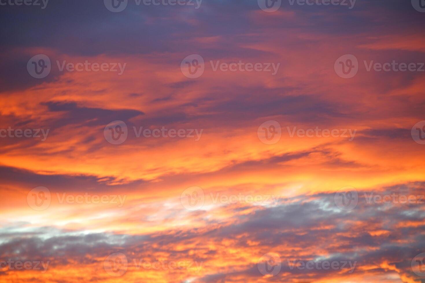 Tangerine Twilight, Stunning Orange Sky with Majestic Clouds photo