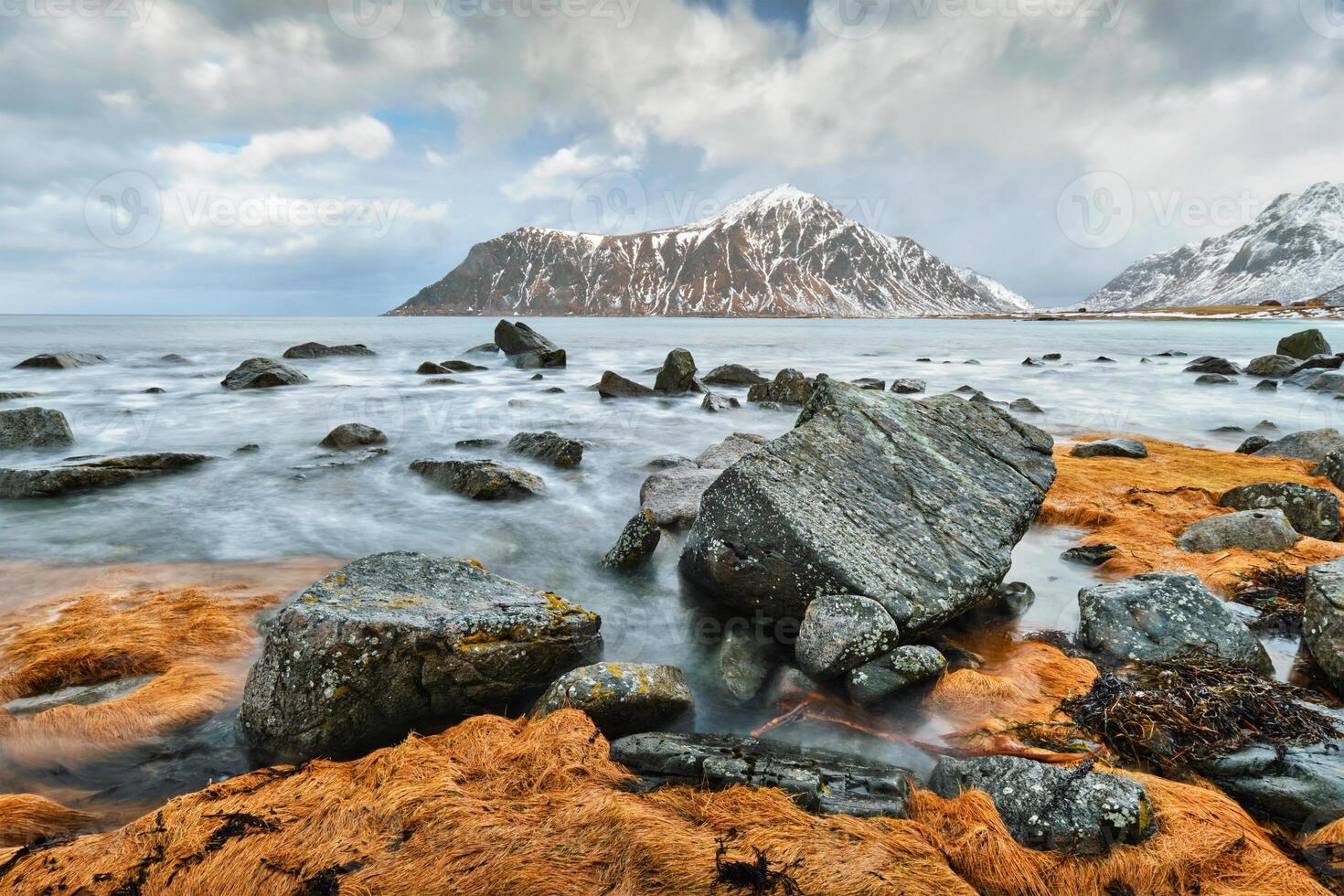 Rocky coast of fjord in Norway photo