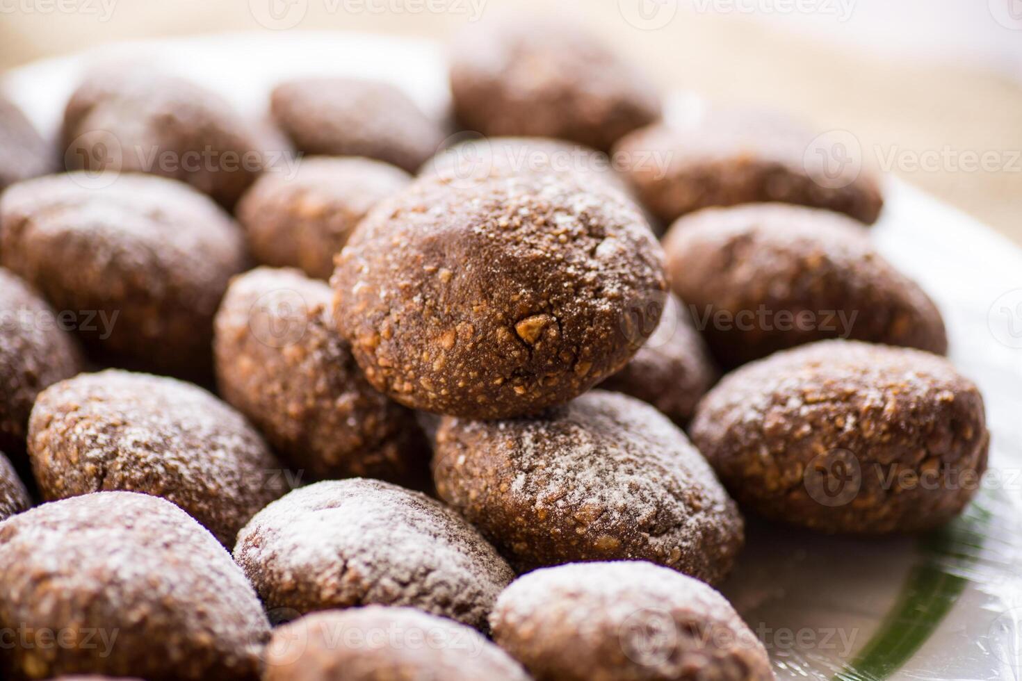 chocolate sweet cakes from mashed biscuits with additives photo