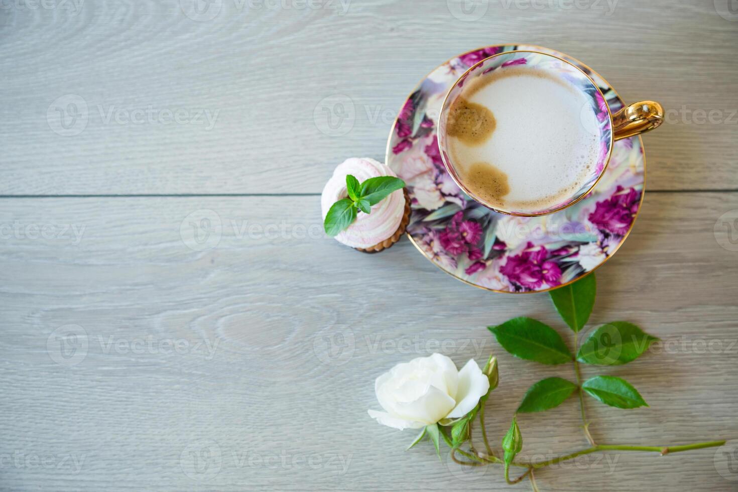 hot natural coffee with milk in a cup photo