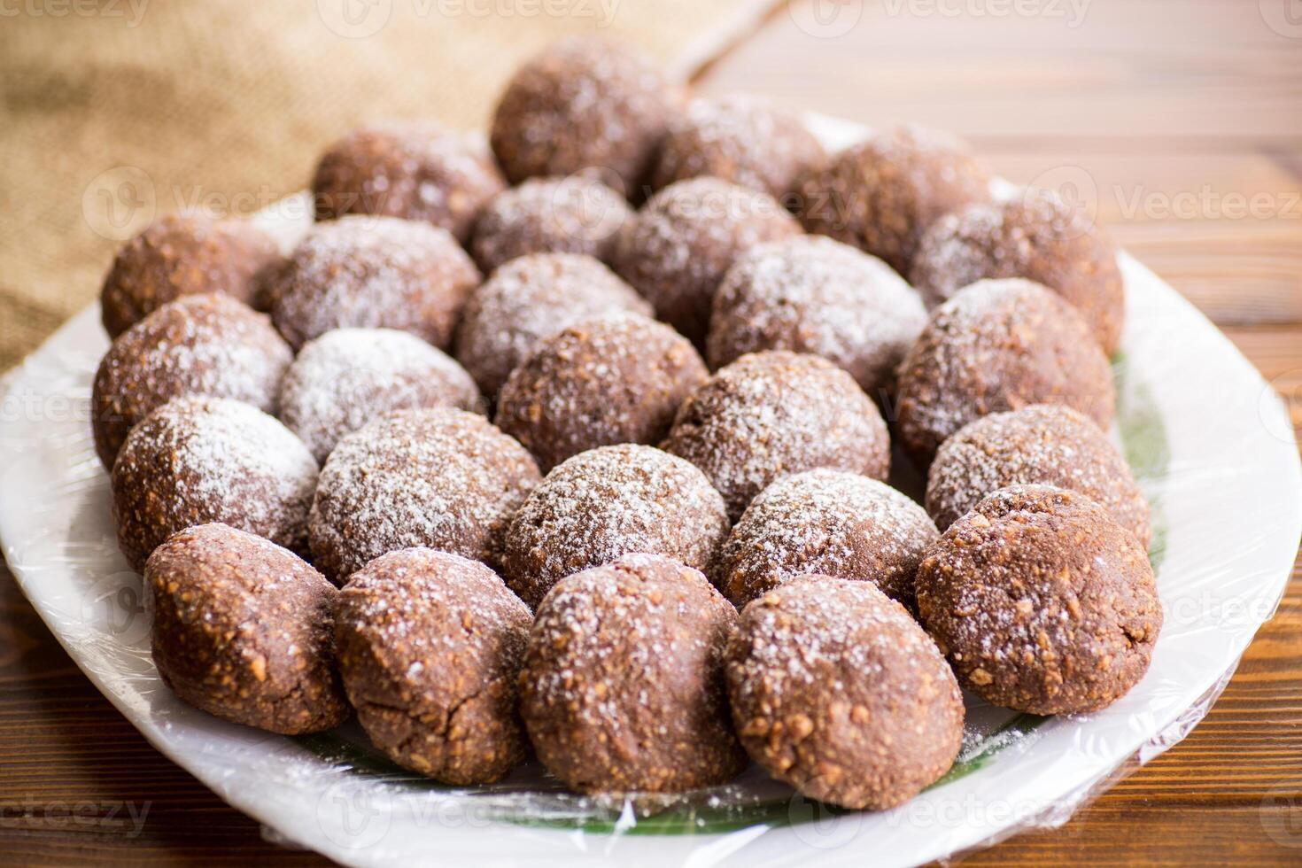 chocolate sweet cakes from mashed biscuits with additives photo