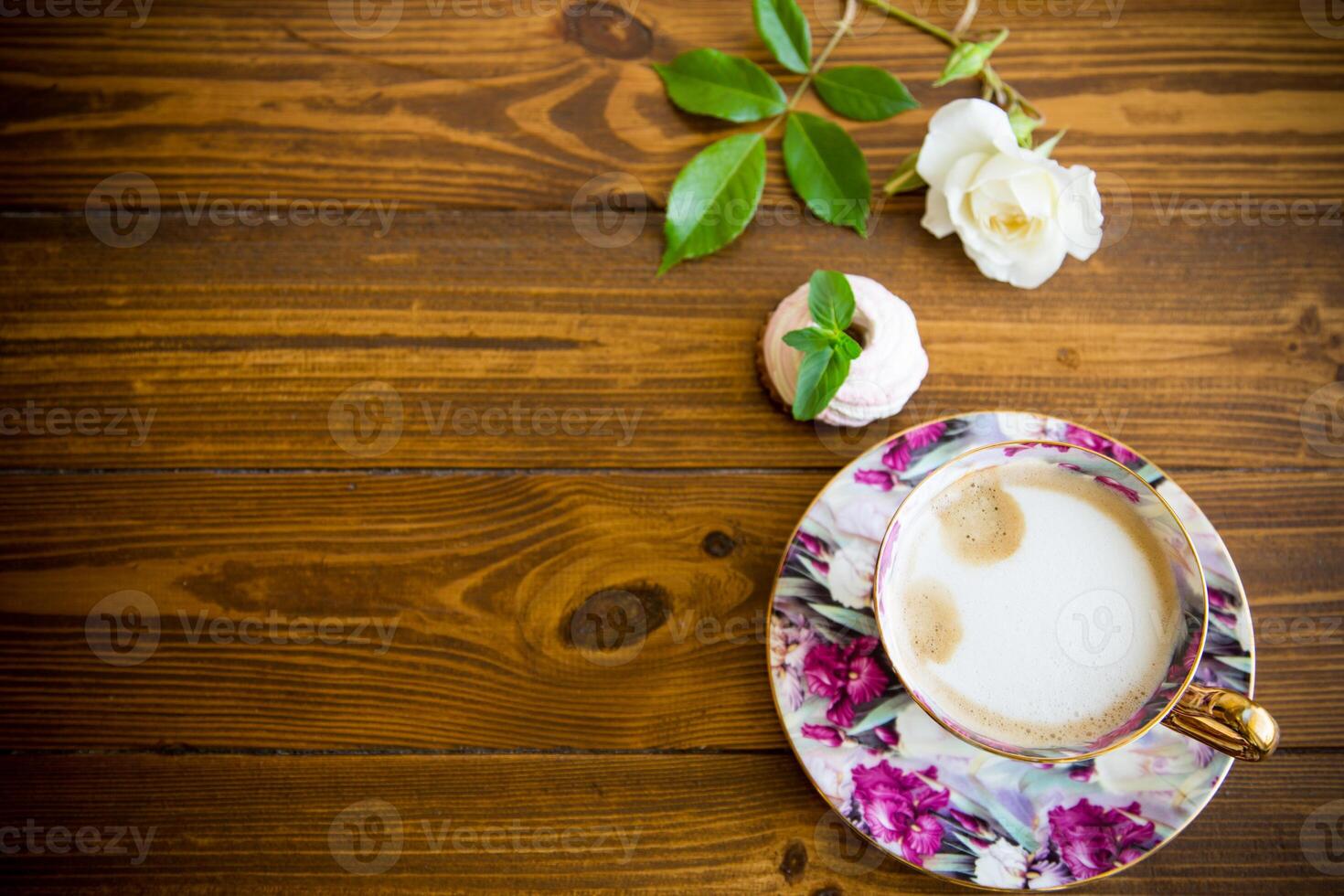 hot natural coffee with milk in a cup photo