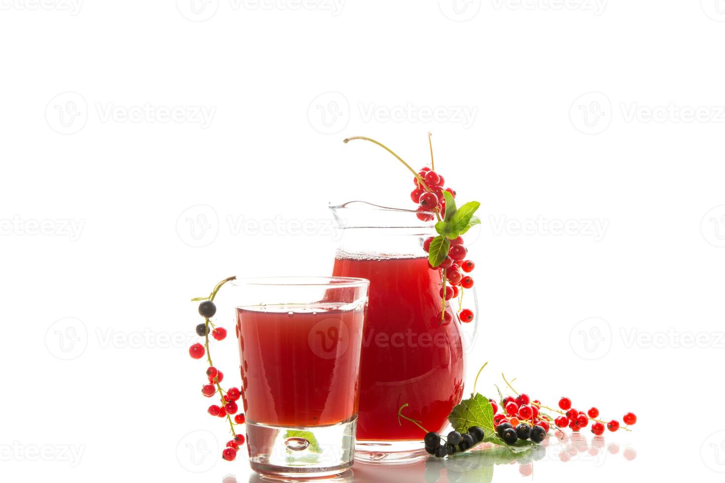 fresh berry juice from red and black currant, on white background photo