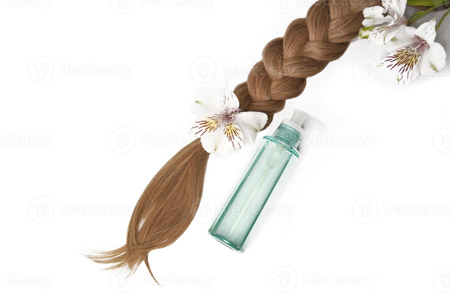 Cosmetic hair oil on a white background. Hair care. Healthy and beautiful hair. Copy space for text photo