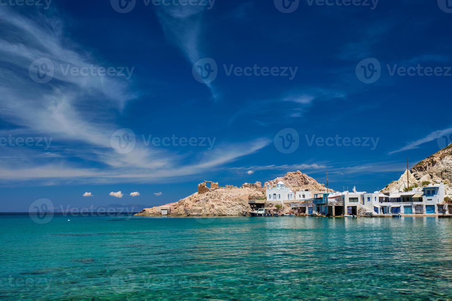 The beach of Firapotamos village in Milos, Greece photo
