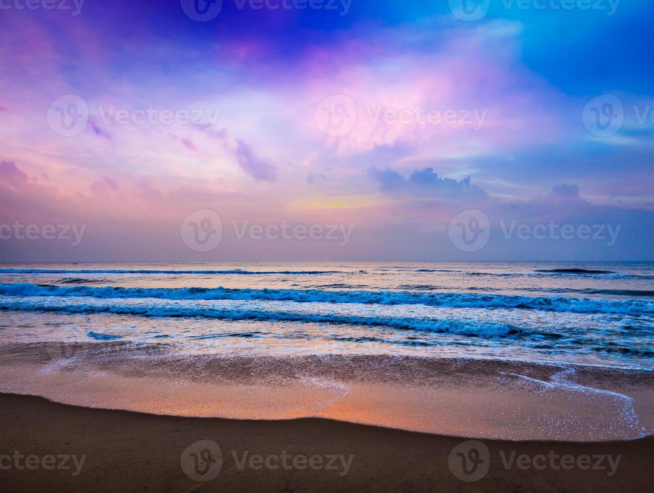 Peaceful ocean sunrise photo