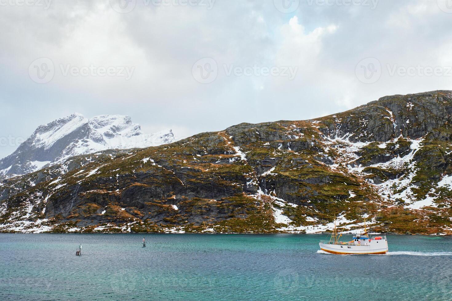 Fishing ship in fjord in Norway photo