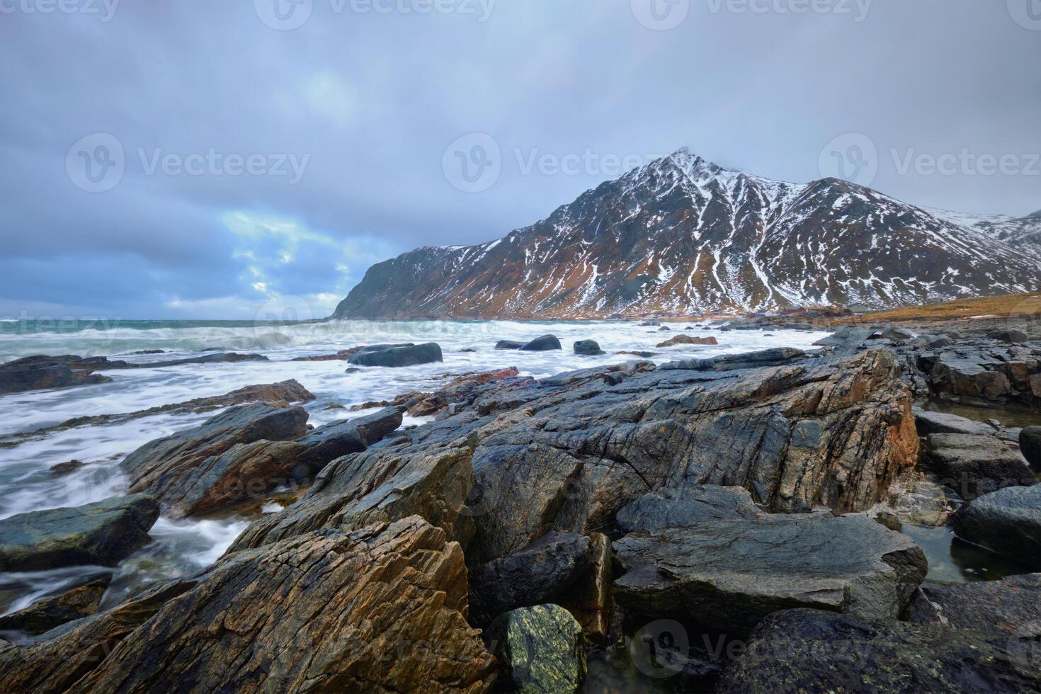 Rocky coast of fjord in Norway photo