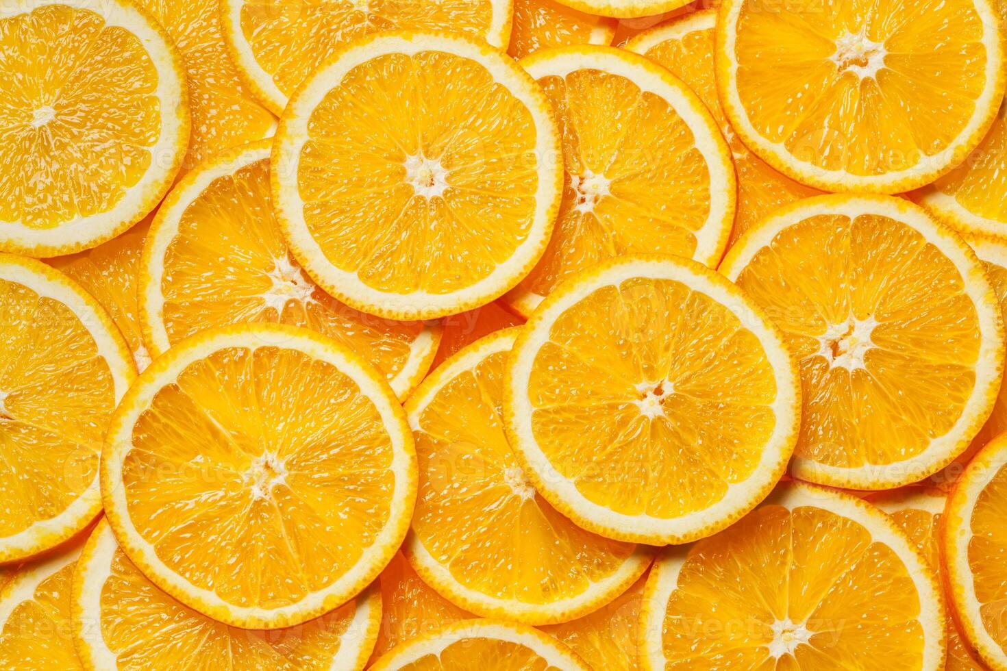 Colorful orange fruit slices photo