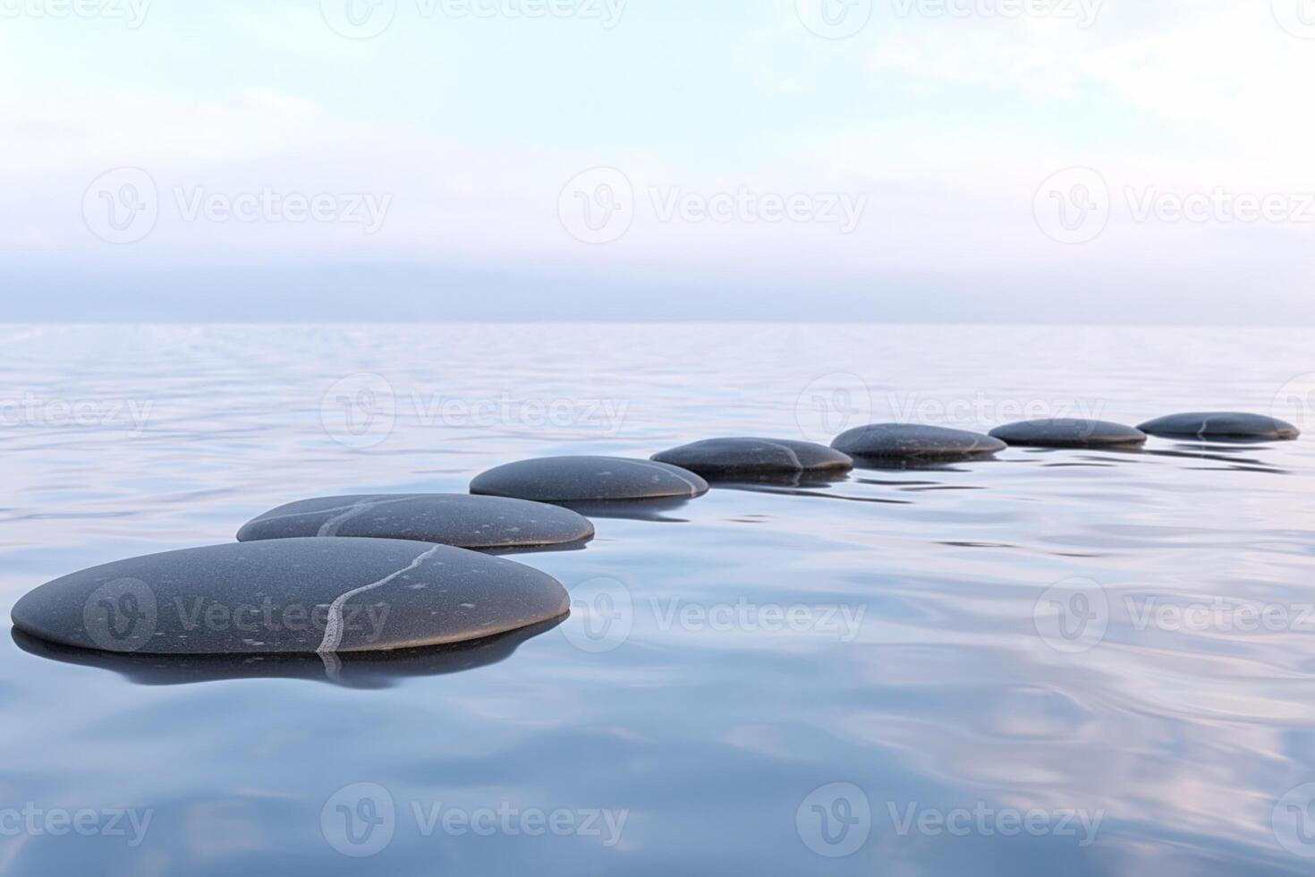 Zen stones in water photo