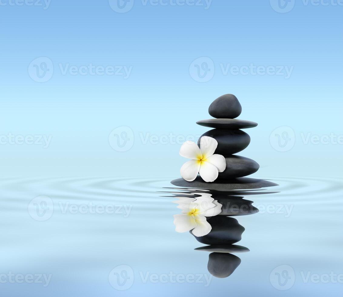Zen stones with frangipani photo