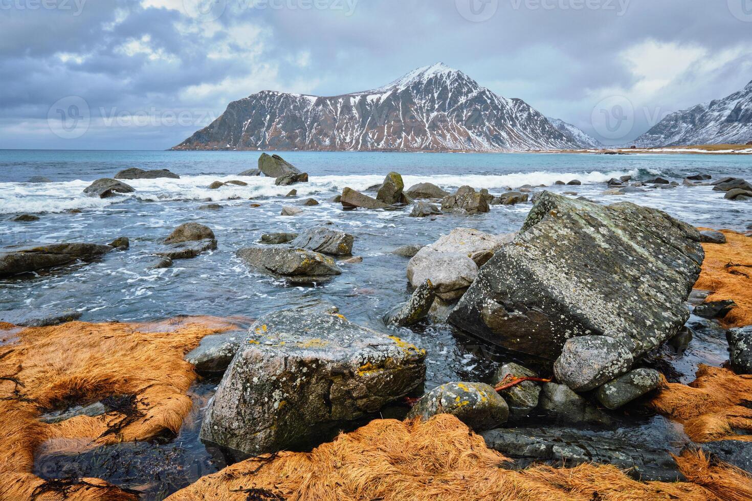 Rocky coast of fjord in Norway photo