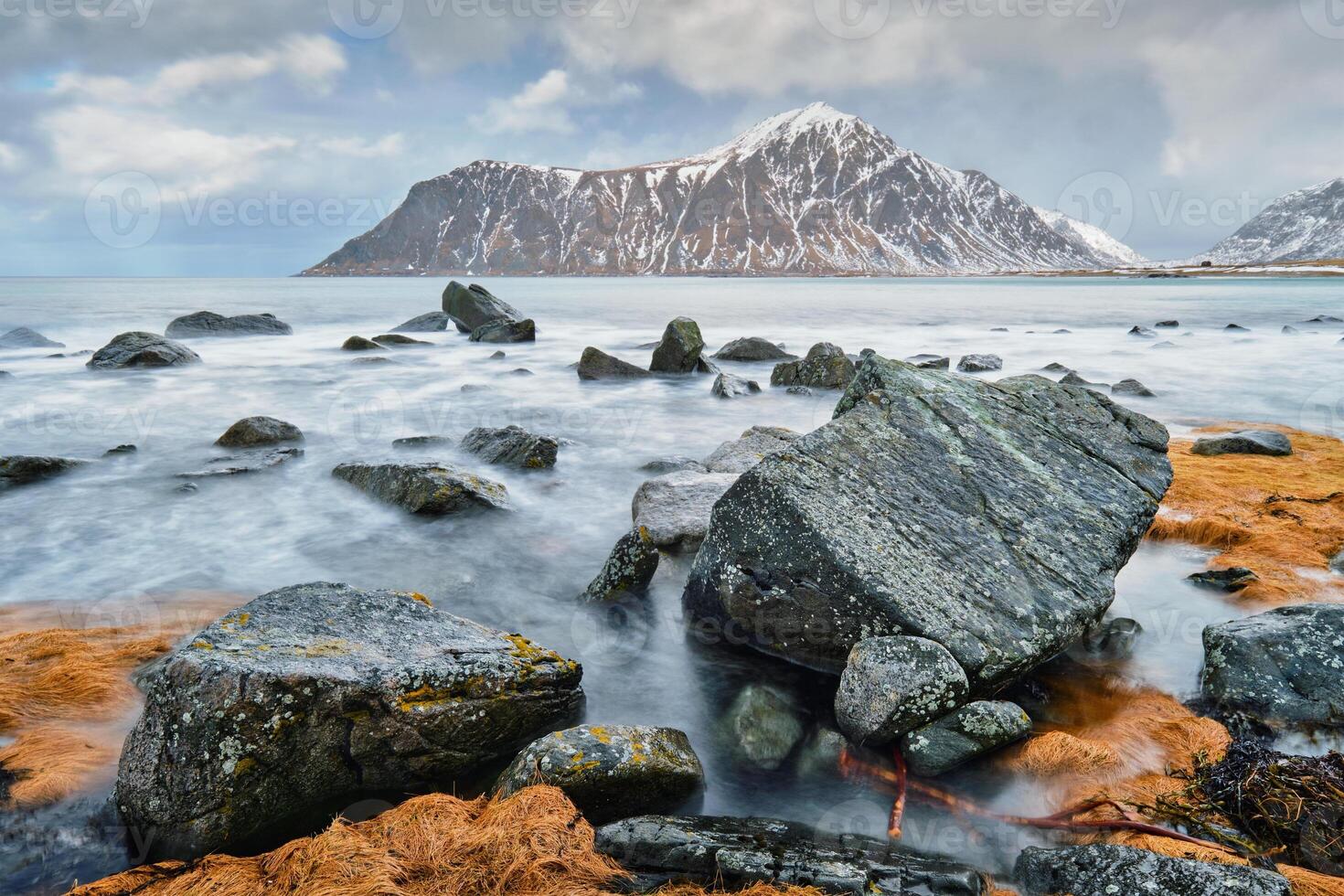 Rocky coast of fjord in Norway photo