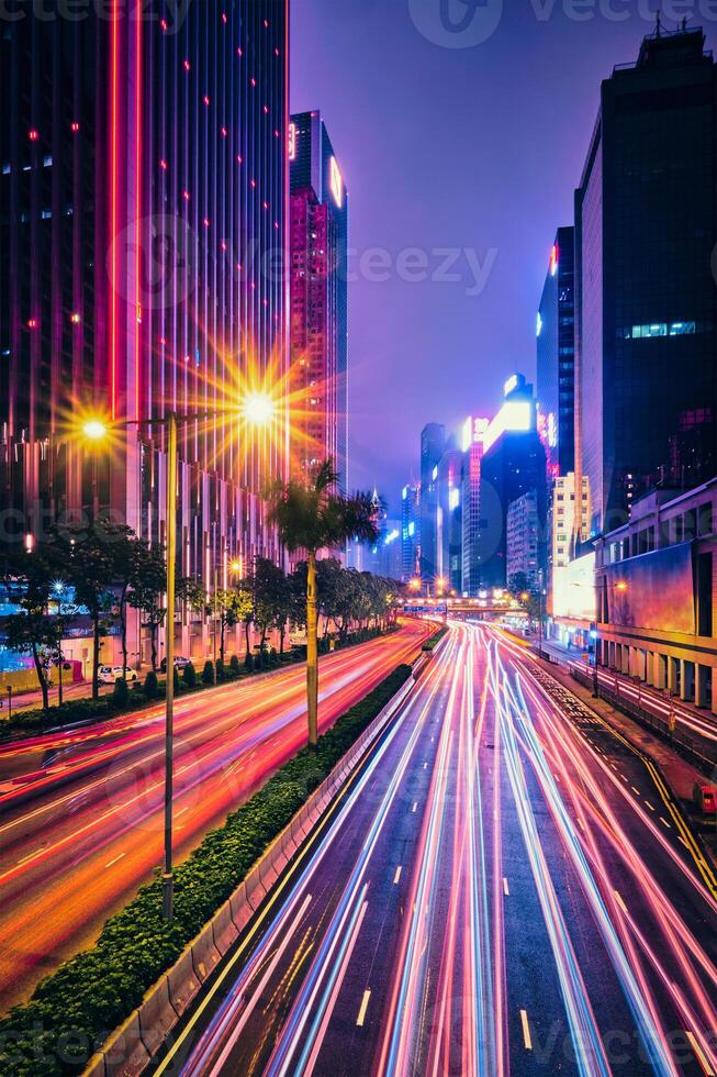 Street traffic in Hong Kong at night photo