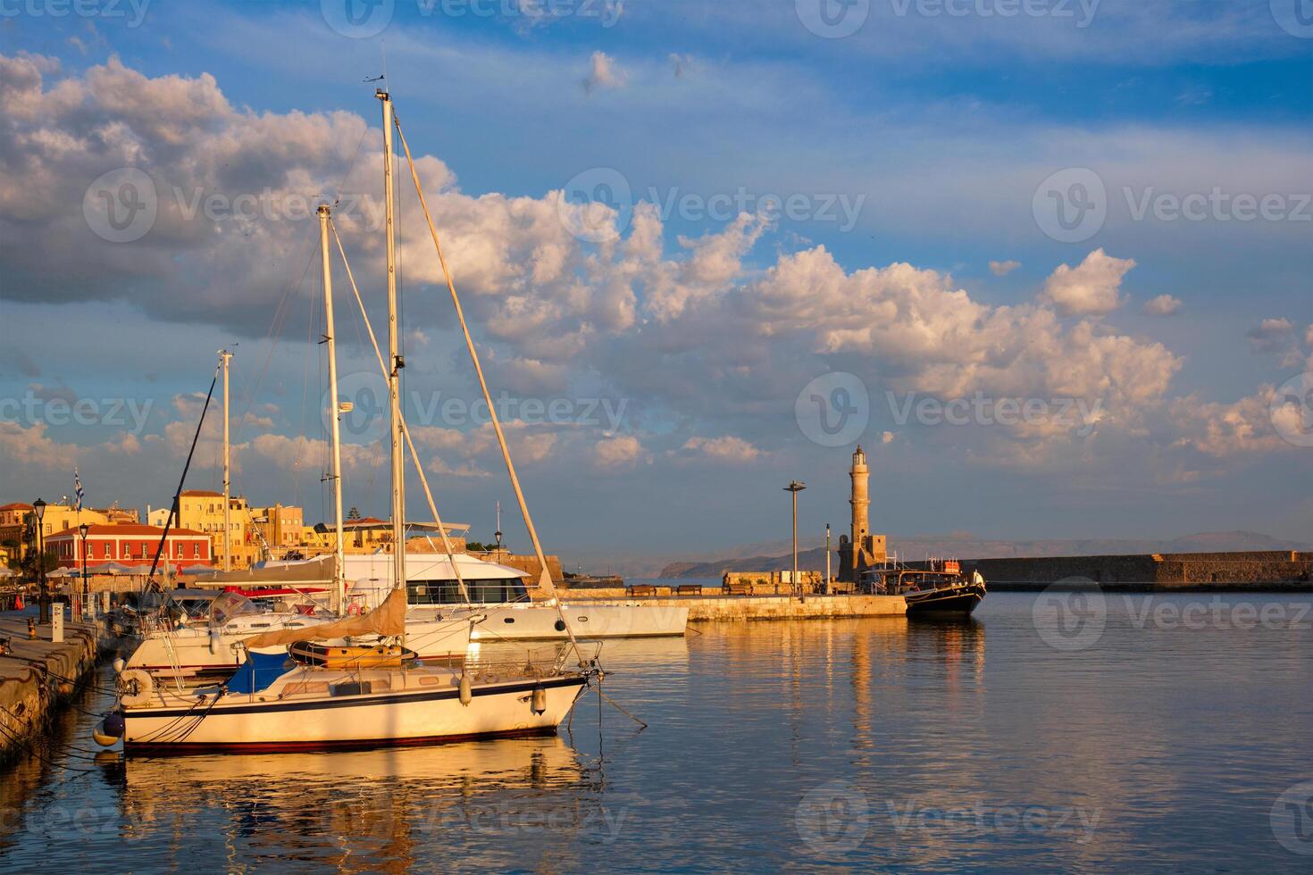 Yachts and boats in picturesque old port of Chania, Crete island. Greece photo