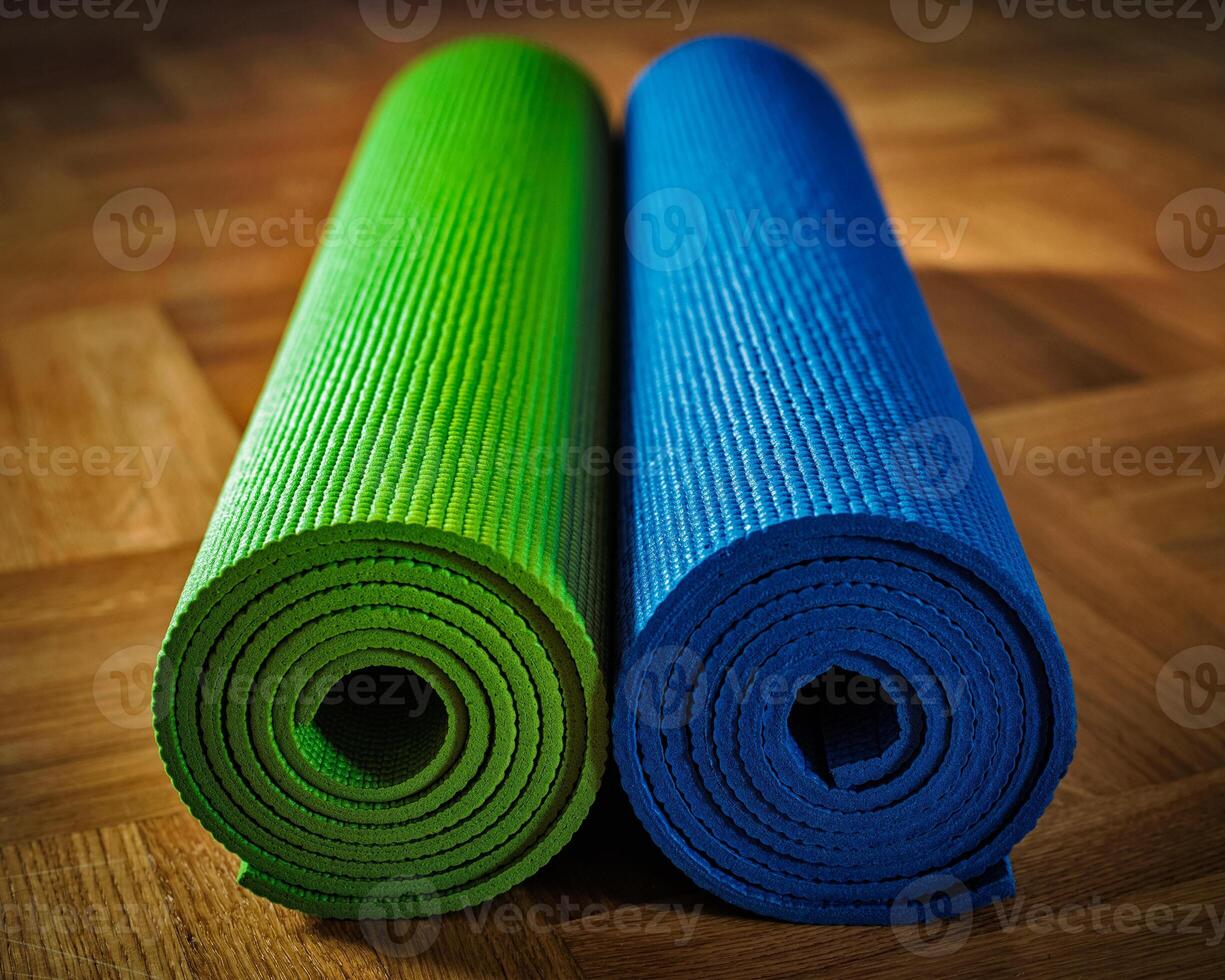 Yoga mat on floor photo