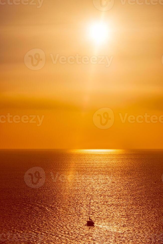Yacht silhouettes in Aegean sea on sunset. photo
