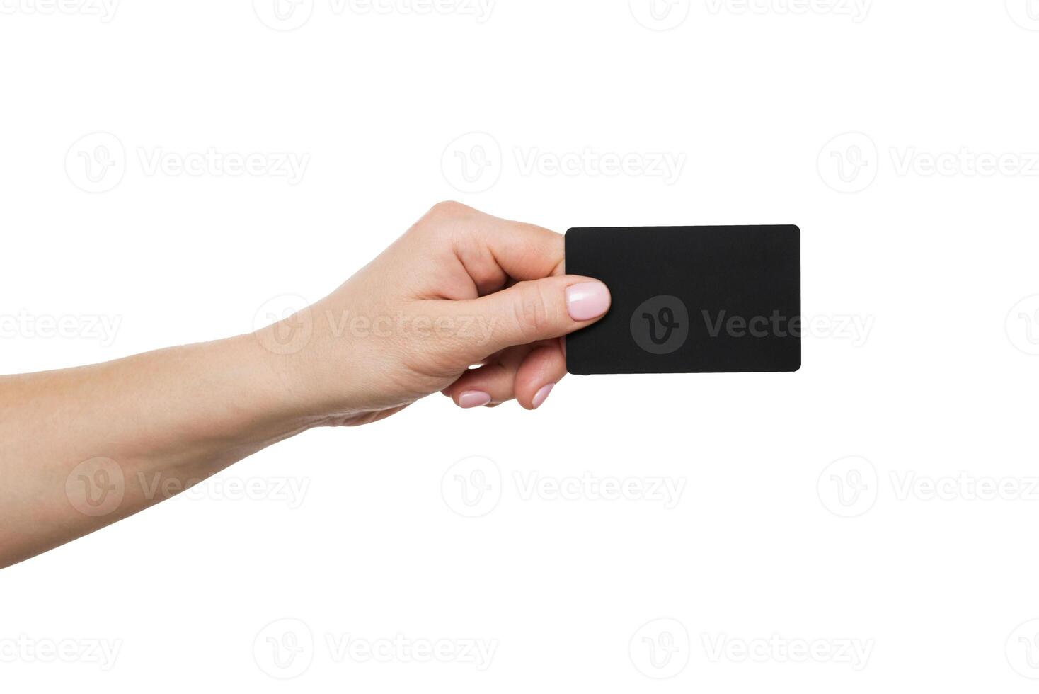 Close up of womans hand holding blank black card photo